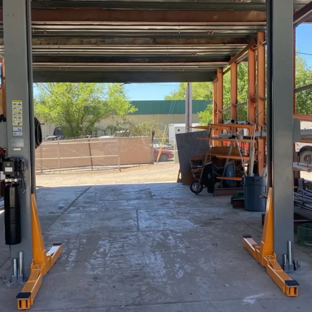 Open service bay with two-post lift at Steiner Auto & Diesel in Prescott, Arizona